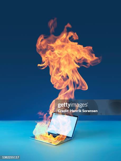 laptop on fire - spark creativity stock pictures, royalty-free photos & images