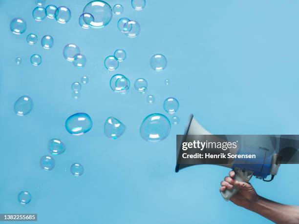 megaphone with bubbles - democracy hands stock pictures, royalty-free photos & images