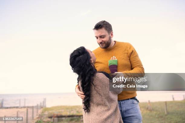 Man Giving Young Woman Piggyback Ride Smiling Side View High-Res Stock  Photo - Getty Images