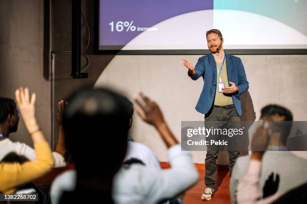 anyone have a question? - presenter stock pictures, royalty-free photos & images