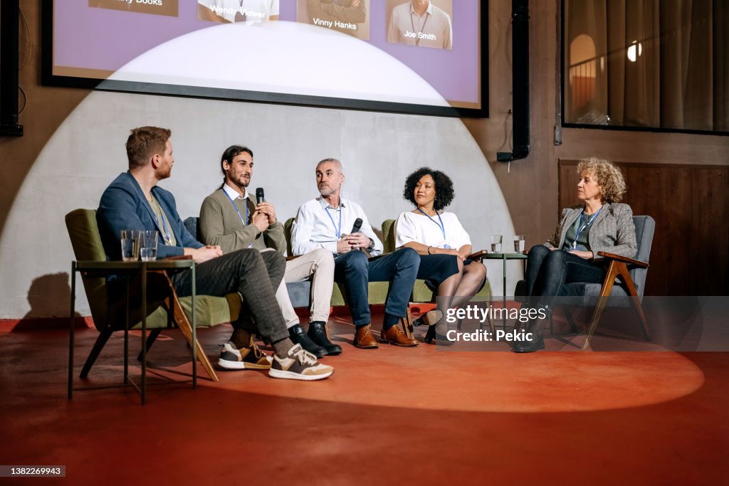 Group of diverse business people on panel discussion