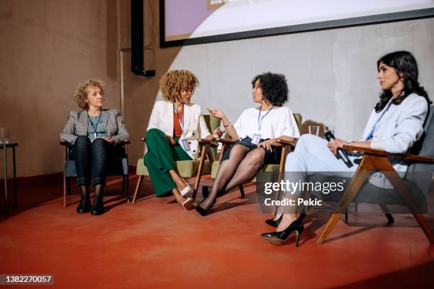 panel discussion involving a diverse group - casual panel discussion stock pictures, royalty-free photos & images