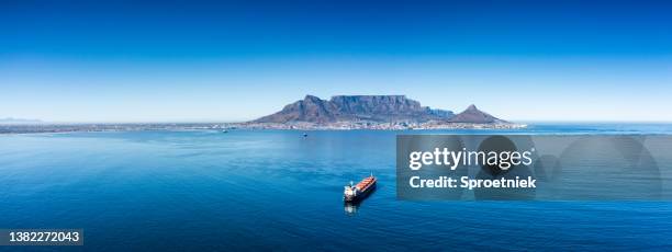 aerial panorama of freight vessel entering table bay harbour - cape peninsula bildbanksfoton och bilder