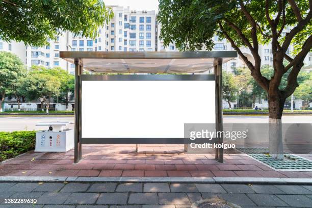 blank billboard at bus stop - horizontal stock pictures, royalty-free photos & images