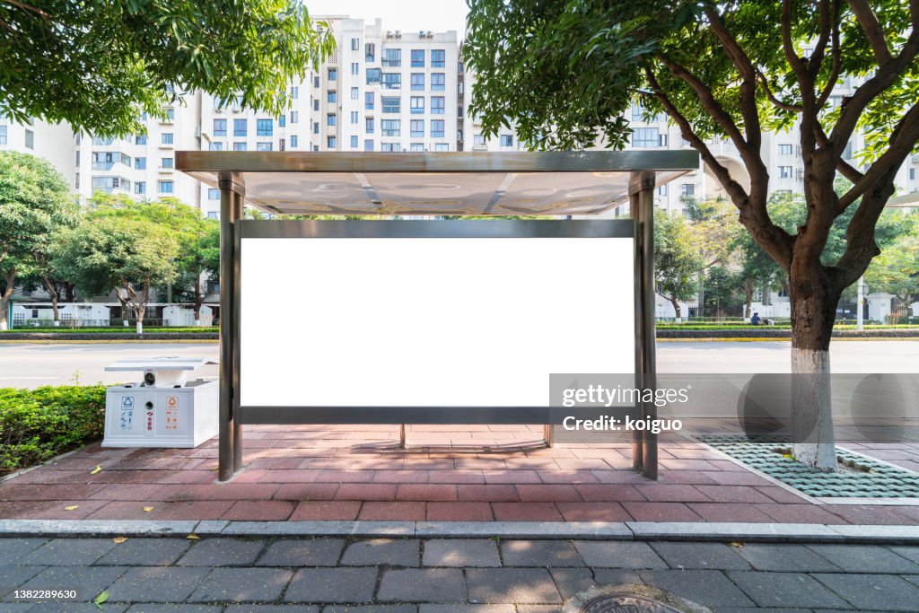 Blank billboard at bus stop