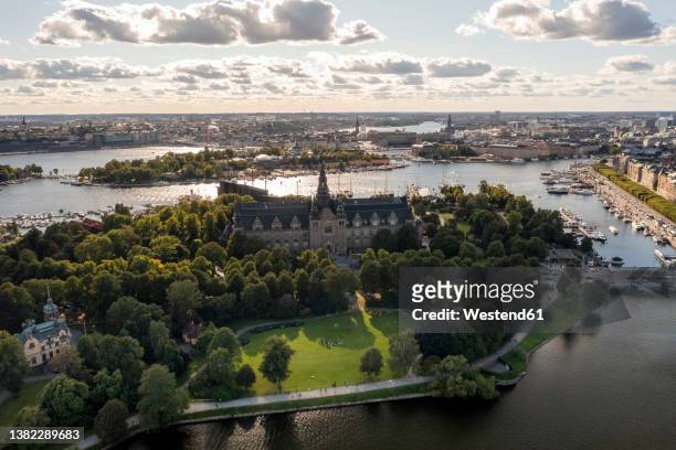 sweden, stockholm county, stockholm, aerial view of nordic museum and djugarden at dusk - natural history museum bildbanksfoton och bilder