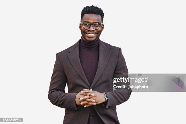 young black cheerful businessman outdoors looking at camera with smile - zwart pak stockfoto's en -beelden