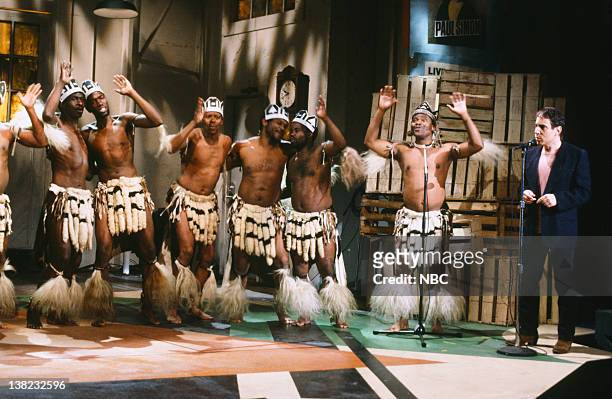 Episode 16 -- Pictured: Musical guests Paul Simon, Ladysmith Black Mambazo perform on May 10, 1986
