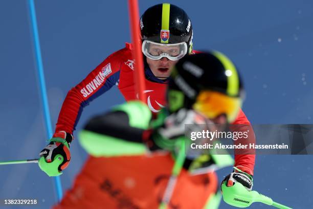 Miroslav Haraus of Team Slovakia competes with Guide Maros Hudik in the Para Alpine Skiing Men's Super Combined Slalom Vision Impaired at Yanqing...