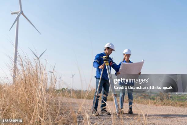 two wind farm engineers - civil engineering stock pictures, royalty-free photos & images