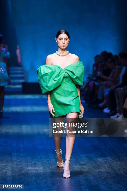 Model showcases designs by Rachel Gilbert during the Melbourne Fashion Festival Runway 1 show on March 07, 2022 in Melbourne, Australia.