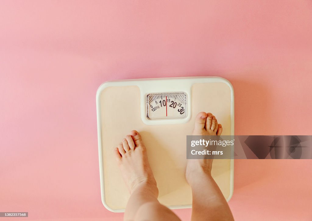 Little feet on a scale