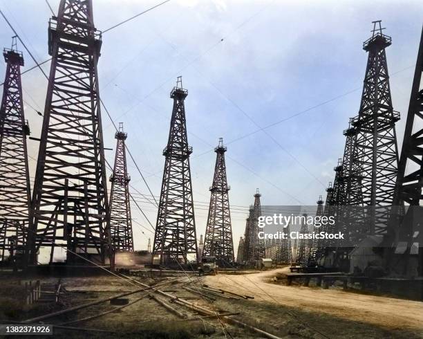 1900s 1901 Rows Of Wooden Oil Rigs Derricks Famous Spindletop Oil Field Beaumont Texas US.