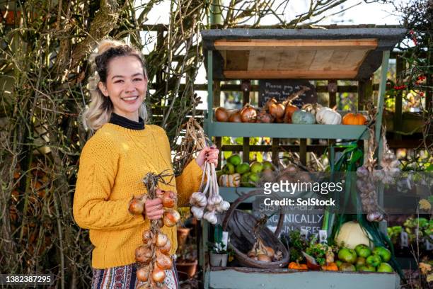 organic stall owner - market stall stock pictures, royalty-free photos & images