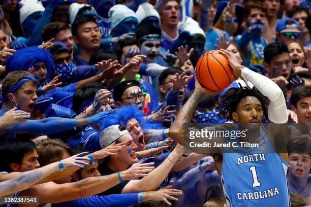 Leaky Black of the North Carolina Tar Heels looks to pass as fans react during the second half of the game at Cameron Indoor Stadium on March 05,...