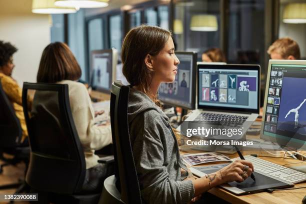 People Using Computer Graphics 21,405 Graphic Design Office Stock Photos, High-Res Pictures, and ...
