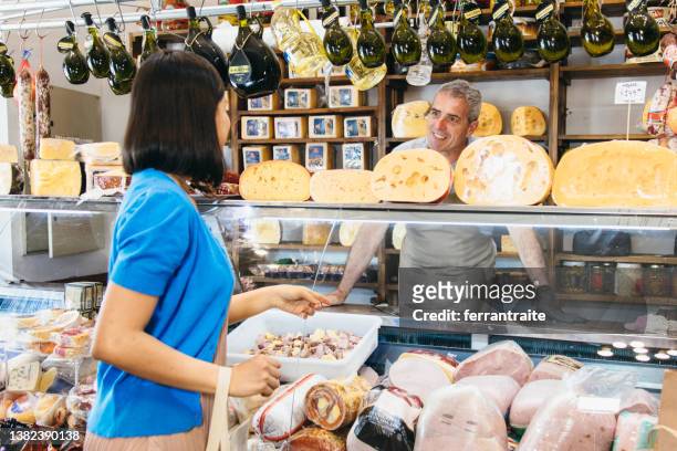 customer ordering at charcuterie - homegrown produce stock pictures, royalty-free photos & images