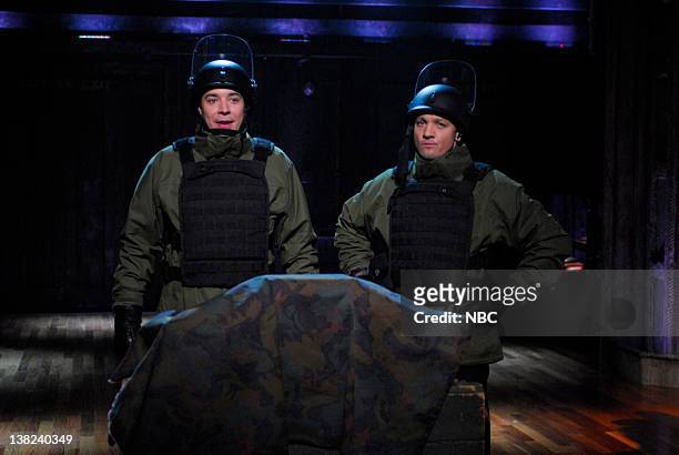 Episode 181 -- Airdate -- Pictured: Host Jimmy Fallon during a skit with actor Jeremy Renner on January 14, 2010