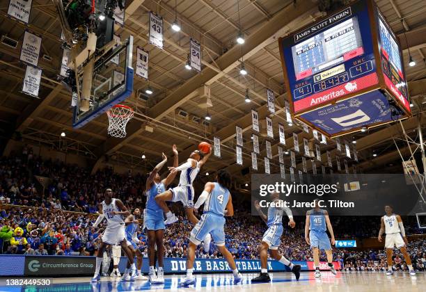 Wendell Moore Jr. #0 of the Duke Blue Devils attempts a dunk during the second half of the game against the North Carolina Tar Heels at Cameron...