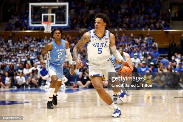 Paolo Banchero of the Duke Blue Devils brings the ball up court during the second half of the game against the North Carolina Tar Heels at Cameron...