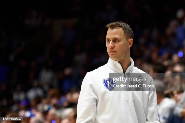 Associate head coach Jon Scheyer of the Duke Blue Devils looks on during the second half of the game against the North Carolina Tar Heels at Cameron...