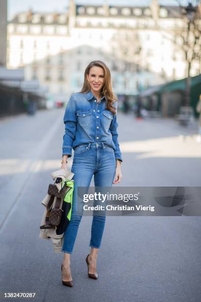 Alexandra Lapp is seen wearing JOOP! blouson in beige, JOOP! denim blouse in mid blue, JOOP! skinny jeans in mid blue, JOOP! multi pocket bag Cortina...