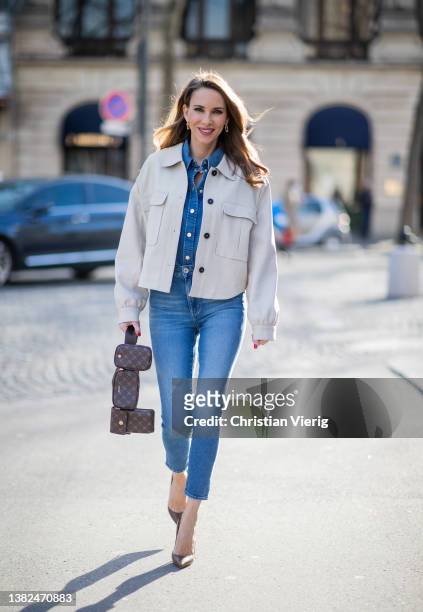 Alexandra Lapp is seen wearing JOOP! blouson in beige, JOOP! denim blouse in mid blue, JOOP! skinny jeans in mid blue, JOOP! multi pocket bag Cortina...