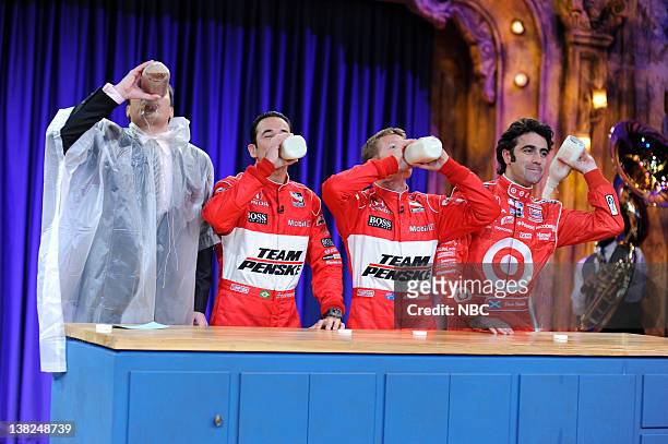 Episode 46 -- Airdate -- Pictured: Host Jimmy Fallon during a milk chugging contest with race car drivers on May 18, 2009