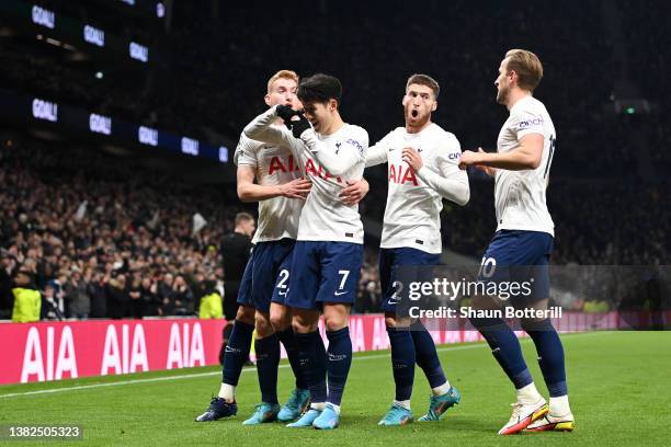 Heung-Min Son of Tottenham Hotspur celebrates with team mates Dejan Kulusevski, Matt Doherty and Harry Kane of Tottenham Hotspur after scoring their...