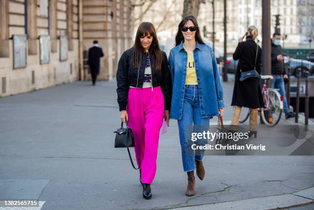 Guests seen outside Sacai during Paris Fashion Week - Womenswear F/W 2022-2023 on March 07, 2022 in Paris, France.