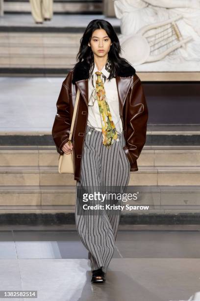 HoYeon Jung walks the runway during the Louis Vuitton Womenswear Fall/Winter 2022-2023 show as part of Paris Fashion Week on March 07, 2022 in Paris,...