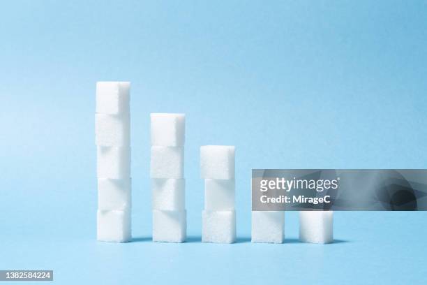 sugar cubes stacks bar chart ascending - sugar stock pictures, royalty-free photos & images