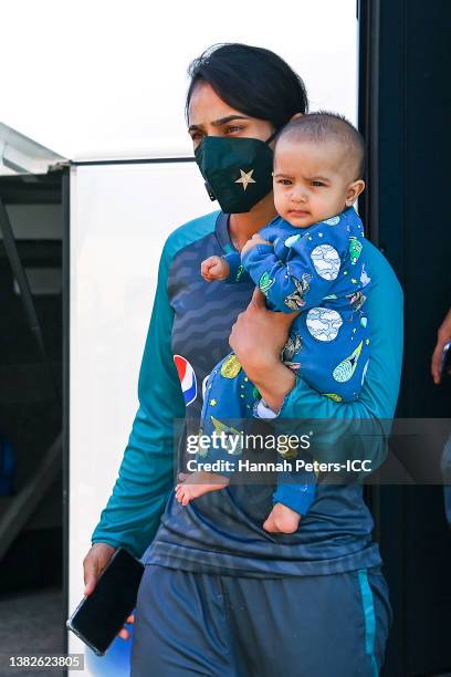 Captain Bismah Maroof of Pakistan arrives with her baby daughter Fatima during the 2022 ICC Women's Cricket World Cup match between Australia and...