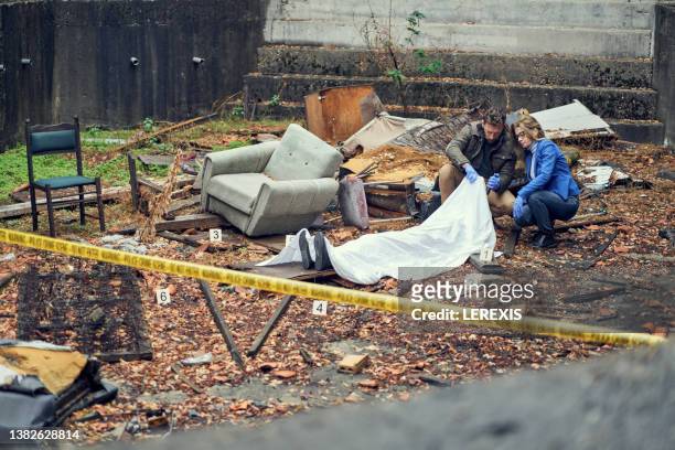 crime scene investigation - murder victim stock pictures, royalty-free photos & images