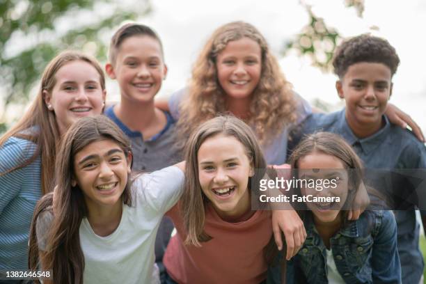 elementary students outdoor portrait - summer school stockfoto's en -beelden