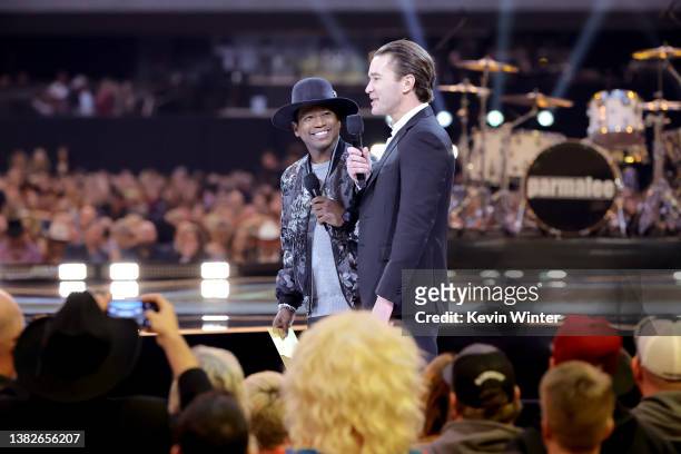 Guy Torry and Tom Pelphrey speak onstage during the 57th Academy of Country Music Awards at Allegiant Stadium on March 07, 2022 in Las Vegas, Nevada.
