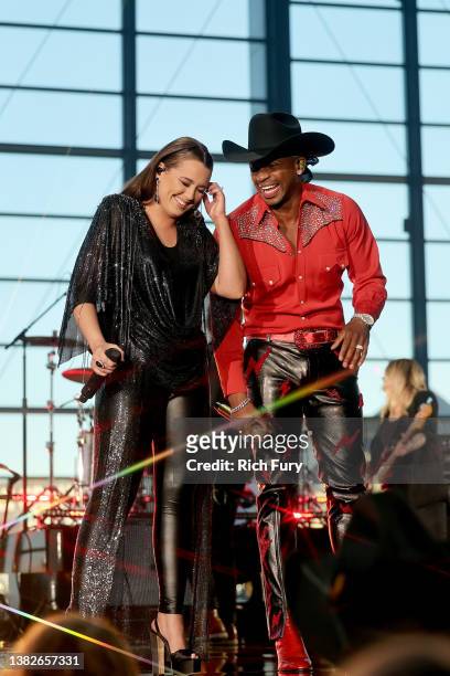 Hosts Gabby Barrett and Jimmie Allen speak onstage during the 57th Academy of Country Music Awards at Allegiant Stadium on March 07, 2022 in Las...