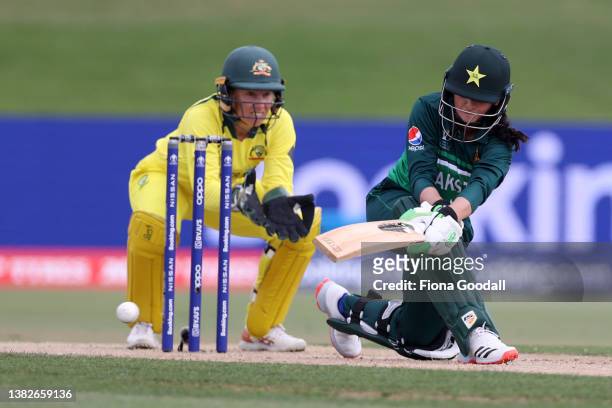Bismah Maroof, captain of Pakistan plays a shot during the 2022 ICC Women's Cricket World Cup match between Australia and Pakistan at Bay Oval on...