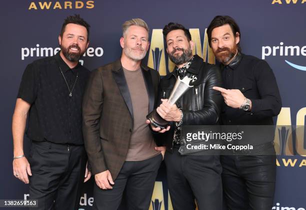 Brad Tursi, Trevor Rosen, Matthew Ramsey and Geoff Sprung of Old Dominion, winners of the Group of the Year award, pose in the press room during the...