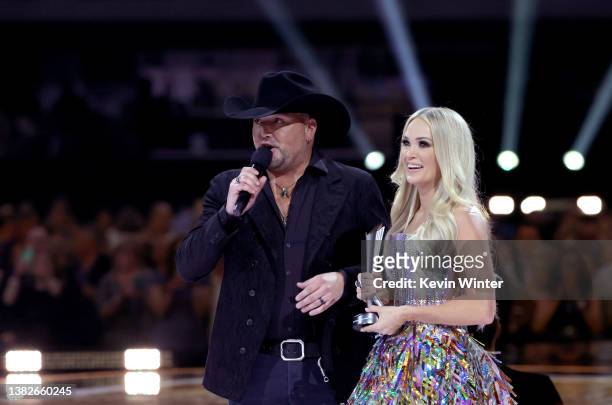 Jason Aldean and Carrie Underwood accept the Single of the Year award for 'If I Didn't Love You' onstage during the 57th Academy of Country Music...