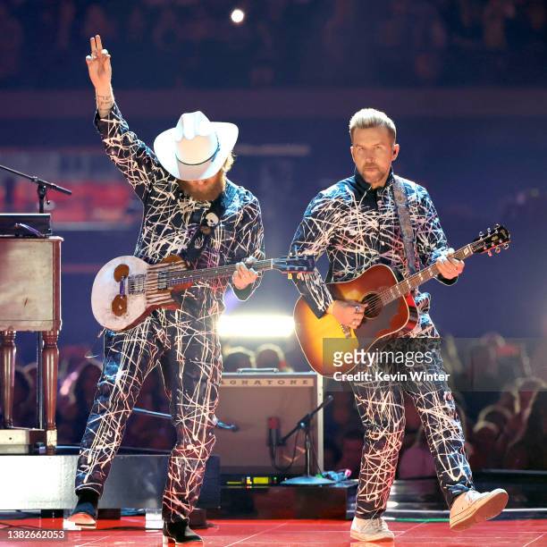 John Osborne and T.J. Osborne of Brothers Osborne perform onstage during the 57th Academy of Country Music Awards at Allegiant Stadium on March 07,...
