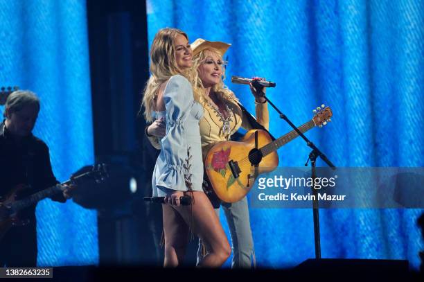 Kelsea Ballerini and Dolly Parton perform onstage during the 57th Academy of Country Music Awards at Allegiant Stadium on March 07, 2022 in Las...
