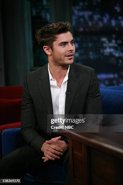 Episode 555 -- Pictured: Zac Efron during an interview with Jimmy Fallon on December 7, 2011