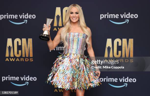 Carrie Underwood, winner of the Single of the Year award for 'If I Didn’t Love You', poses in the press room during the 57th Academy of Country Music...