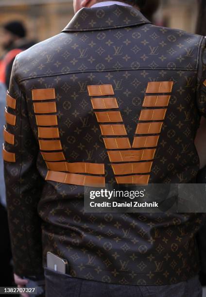 Guest is seen wearing a Louis Vuitton jacket outside the Louis Vuitton show during Paris Fashion Week A/W 2022 on March 07, 2022 in Paris, France.