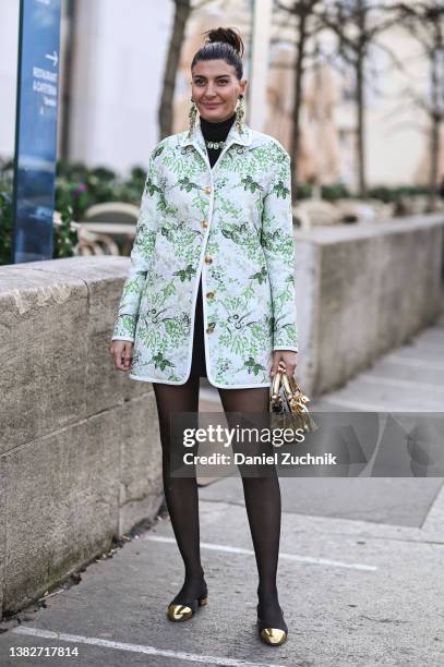 Giovanna Battaglia is seen wearing white and green jacket and Giambatista Valli shoes and bag outside the Giambatista Valli show during Paris Fashion...