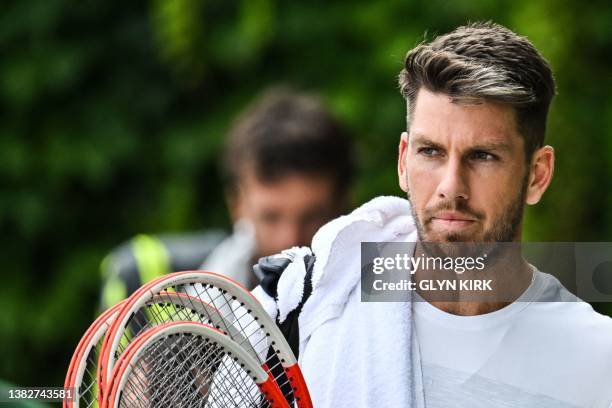 Britain's Cameron Norrie arrives for a training session prior to the start of the 2023 Wimbledon Championships at The All England Tennis Club in...