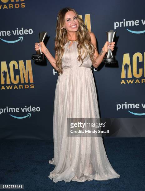 Carly Pearce, winner of Female Artist of the Year and Music Event of the Year awards, poses in the press room during the 57th Academy of Country...