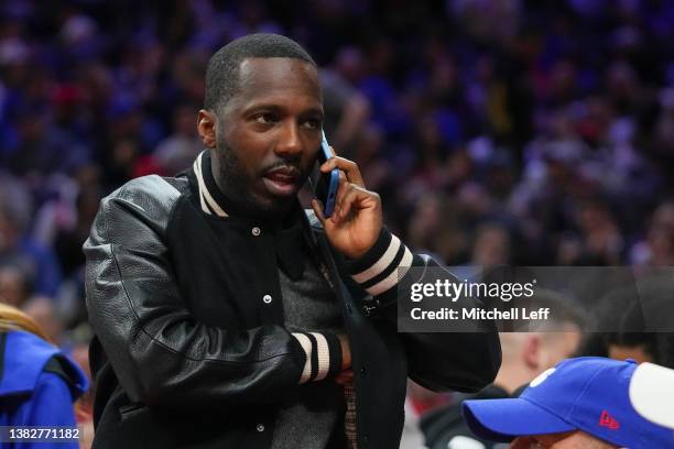 Agent Rich Paul talks on the phone during the game between the Chicago Bulls and Philadelphia 76ers at the Wells Fargo Center on March 7, 2022 in...