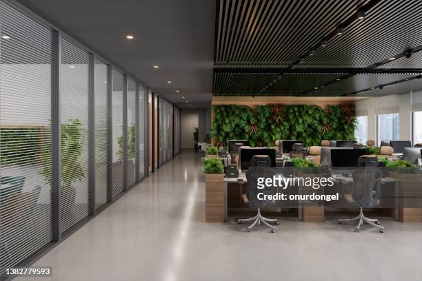 interior do escritório de plano aberto moderno ecológico com mesas, cadeiras de escritório, sala de reunião e jardim vertical - lounge chair - fotografias e filmes do acervo
